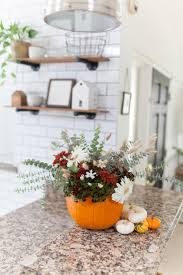 I've been using this stuff since i heard in this forum that the cardboard outsides peal off easily. Diy Pumpkin Flower Arrangement With Trader Joe S Flowers Andi Mans