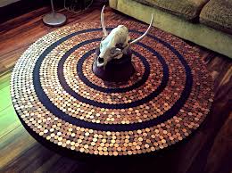 Round Penny Table Created From A Wagon Wheel Penny Decor Penny Table Penny Table Tops