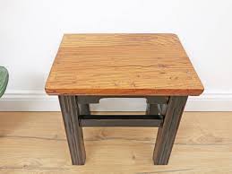 A sturdy structure of solid wood gives them noticeable scandinavian style. Chinese Stool Bedside Table In Solid Wood Black Yajutang Mobel Gmbh