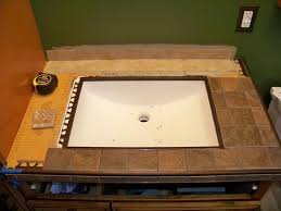 But choosing the best undermount kitchen sinks require knowing the things to look out for. Kerdi Board Undermount Sink With Tile Countertop Project Photos Ceramic Tile Tile Countertops Undermount Sink Sink