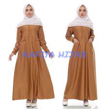 Memakai gamis juga membuat penampilan wanita lebih tertutup sempurna tanpa memperlihatkan bentuk tubuh karena bentuknya yang panjang sekaligus longgar. Model Baju Dinas Gamis Terbaru Diary Hijaber