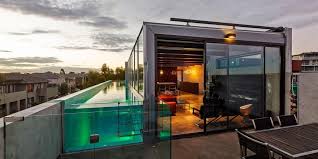 But if your house doesn't have enough space in the yard or in the ground floor for a pool, you can always have one in the rooftop. Skyline Drive House With Panoramic Views And A Glass Rooftop Pool Design Swan
