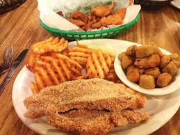 · hush puppies · french fries · coleslaw · braised greens · red beans. Grampa S Catfish Nuff Said