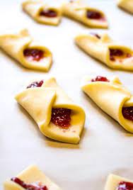 This link is to an external site that may or may not meet accessibility guidelines. Raspberry Bow Tie Cookies Recipe Holiday Cookies Bow Tie Cookies Cookies Recipes Christmas