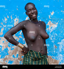Naked Breasts Bodi Smiling Bodi Woman Portrait With Scarified Skin Hana  Mursi Village Omo Valley Ethiopia Stock Photo - Alamy