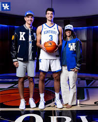 FIRST LOOK: Milan Momcilovic putting on the Kentucky uniform for the first  time. “Im going to bring a good positivity to the court, and a good  personality. I'm also going to bring