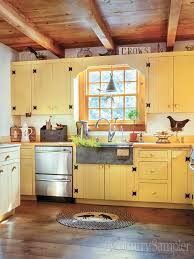 June July 2015 Country Sampler Yellow Kitchen Cabinets Yellow Kitchen Designs Country Kitchen