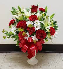 Although their primary business is as a floral boutique, the professionals can assist with event designs and decor. Love You Forever Arrangement In Arlington Va Arlington Cemetery Flowers By Twin Towers Florist