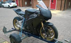 There are two release triggers inside the mechanism. How To Strap Down A Motorcycle Tips For Strapping Bike On Trailer Or Van