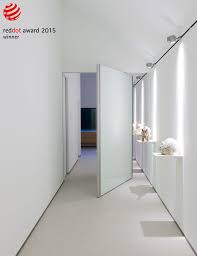 Modern Pivoting Wall Or Room Divider Which Anyway Doors Prefers To Call It S Pivoting Doors We Receiv Doors Interior Modern Pivot Doors Glass Doors Interior