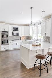 Perhaps, white subway tiles are the most ubiquitous tiles that are. Grey And White Kitchen Elise Forness Interior Design Mollyhensley Com
