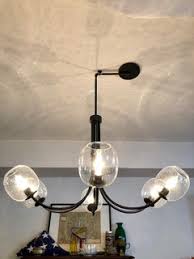 Here's the best easy, affordable & gorgeous diy option around! Is It Tacky To Swag A Chandelier For The Dining Room Table