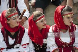 Volunteers in kosovo work with their communities on projects in education and community economic development. A Kosovo Albanian Girl Dressed In A Traditional Outfit Takes Part In The Traditional Games Albaniada An Event To Traditional Outfits Albanians Girls Dresses