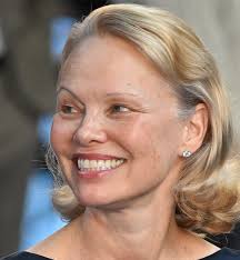 Weeds' Star, 60, Looks Ageless in All-White Suit