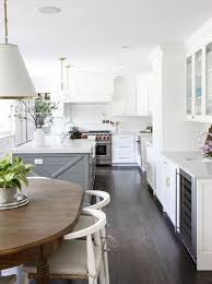 Balancing this expanse of floor, white cabinetry and walls keep the dark wood from overpowering the room and ensure the room stays open and bright. 12 Dark Wood Kitchen Floor Ideas That Are Pure 2020 Luxury Home Decor Weddings