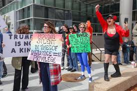 Demonstrators gather at City Hall to protest Pres. Donald Trump