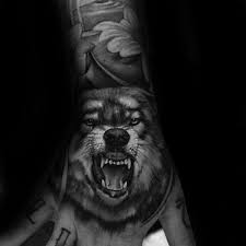 50 Realistic Wolf Tattoo Designs For Men Canine Ink Ideas Tattoo Designs Men Wolf Tattoos Wolf Tattoo