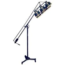 With a satellite style lampshade, our tripod floor lamp has a very unique appearance unique vintage design: Tall Vintage Industrial Photographic Metal Floor Lamp With Six Adjustable Shades For Sale At 1stdibs