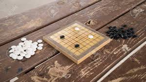Restoration games es uno d. Juego De Mesa Chino Go O Weiqi Piedras En Blanco Y Negro Y Tablero Pequeno Hecho A Mano Posicion De Apertura