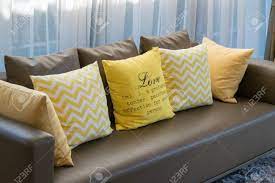 Pure lambskin leather luxury cushion pillow cover bed soft sofa decorative brown. Modern Living Room Design With Brown Sofa And Yellow Pillows Stock Photo Picture And Royalty Free Image Image 39329644