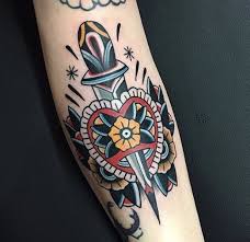 Dagger and flower to add some color to my pirate thigh. Traditional Dagger Heart And Flowers Tattoo Tattoogrid Net