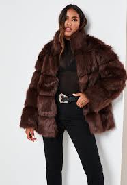 • hooded ⦁ faux fur trim ⦁ faux fur lining panels ⦁ high neckline ⦁ press stud fastening collar guard ⦁ zip through front fastening ⦁ contrast trims ⦁. Brown Pelted Faux Fur High Collar Coat Missguided