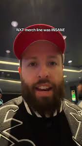 Megan Bayne and Penelope Ford Cook with AEW Gear