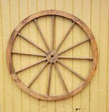 Western wagon wheel wooden wall decor 24 in new rustic barn westernshoppe 5 out of 5 stars (336) $ 59.95 free shipping add to favorites wooden wagon wheel (set of 4), oak veneer, strong wheels, cannon wheels, hobby wheels wildlyhandy 5 out of 5 stars (73. Large 36 In Steel Rimmed Wooden Wagon Wheel Decorative Wall Decor Ebay