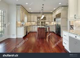 Considered one of the softer hardwoods, it still offers plenty of durability. Kitchen Cherry Wood Floors Stock Photo Edit Now 41064169 Cherry Wood Floors Wood Floor Kitchen Kitchen Flooring