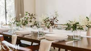 Such a calm color palette with plush fabrics & a gorgeous tufted headboard, crystal chandelier & a ginormous armoire. Setting A Table With Kourt And Jenni Kayne Poosh