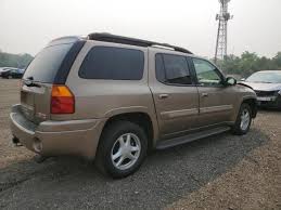 Image result for Wheatland Yellow 2003 Envoy