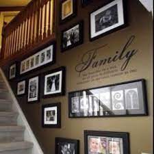 When located near the entryway to the home, cabinets can be used to store shoes or jackets in an easily accessible area. Decorating Ideas For Wall Going Up Stairs Google Search Home Deco Home Decor Family Wall