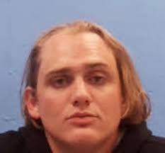 Man driving without headlamps