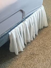 If you're not up for sewing and want a fast and easy bed skirt, you can use a fitted bed sheet instead. Bed Skirts