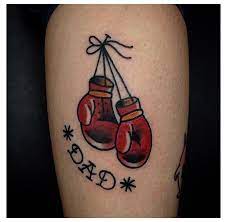 Click here to visit our gallery: Traditional Boxing Gloves Tattoo By Justin Wayne Boxing Gloves Tattoo Traditional Boxingglovestatto In 2021 Boxing Gloves Tattoo Boxing Tattoos Traditional Tattoo