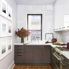 Dark kitchen cabinets can sometimes look too strong and overwhelming, but a good way to tone it down is to use a light colored countertop and a light colored kitchen island. Best Two Toned Kitchen Cabinet Ideas