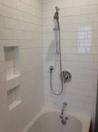 Oversize White Subway Tile Light Grey Grout Handheld Shower Large Shower Cubby Shower Tile White Tile Shower Primitive Bathrooms