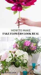 The vibrant colours of the blushing bride flower and billy button flowers will bring life to any dull space. Fake Flower Arrangements Make Them Look Real Diy Fake Flower Arrangements Fake Flowers Fake Flower Arrangements Diy