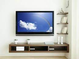 The design is simple and includes a long shelf above the tv which frames the design beautifully. 40 Tv Wall Decor Ideas Inspirational Tv Wall Design Decoholic Shelves Under Tv Tv Wall Decor Living Room Tv