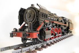 The steam engine uses the force produced by steam pressure to push a piston back and forth inside. Steam Engine The Lego Car Blog