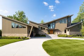 When homeowners Andrea and Mark Brimmer decided they wanted to raise their  family in a Mid Century Modern home, they knew that they would have to  build it themselves. “We have both