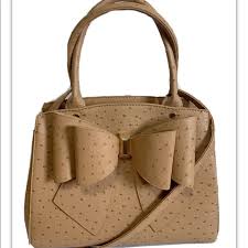 There are 1867 coffee handbag for sale on etsy, and they cost ca. Crossi Bags New Crossi Womans Bow Handbag Purse Camel Tan Poshmark
