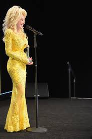The official facebook of dolly parton 🦋. This Mustard Yellow Dress Is One Of Dolly Parton S Best Looks Dolly Parton Dolly Parton Young Dolly Parton Pictures