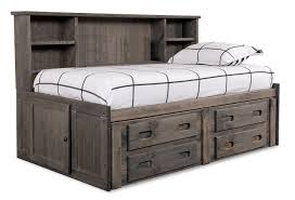 Finished in durable deep black laminate, laminated composite wood and a sturdy mdf backer. Piper Full Storage Bed The Brick