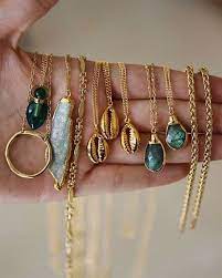 We Are Obsessed With Our Tropical Gold Cowrie Shell Necklace It S Made With A 24k Gold Electroplated C Fashion Jewelry Cowrie Shell Necklace Beautiful Jewelry