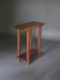 Features a round, powder coated steel top hoisted by wood legs. Small Table W Low Shelf Narrow End Table Live Edge Wood Etsy