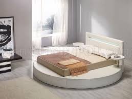 This very modern black and white floating bed unit is a good example of a floating bedroom system. Round Leatherette Platform Bed Palazzo White
