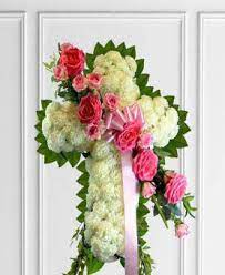 We would like to show you a description here but the site won't allow us. Pink White Sympathy Cross Avas Flowers