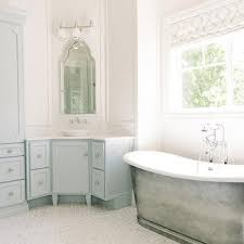 There are four drawers, two cabinets, and room for two sinks on the top. Master Bathroom Corner Vanity Design Ideas