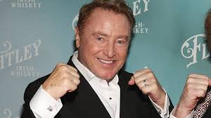 Michael Flatley looks happier than ever as he poses with his rarely-seen  son and lookalike brother at whiskey launch